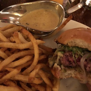 The Smith - Burger Supreme, cooked to a medium rare and served with crispy fries and a green peppercorn sauce. - New American Near Me - New York, New York The Smith - Burger Supreme, cooked to a medium rare and served with crispy fries and a green peppercorn sauce. - New American Near Me - New York, New York