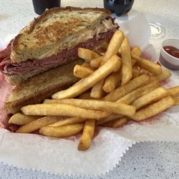 Ruben with Pastrami, sauerkraut, thousand island, crispy edge bread. Nice crunchy fries. Ruben with Pastrami, sauerkraut, thousand island, crispy edge bread. Nice crunchy fries.