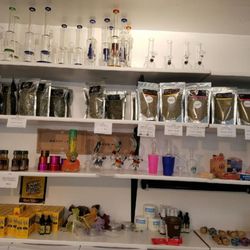 420 Holiday - Shelves of Marijuana and Cannabis Related products inside the Dispensary