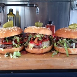 THE PIG AND THE HEN - Organic beef, gruyere, onion jam, local butter leaf, and homemade aioli on a homemade sesame burger bun.