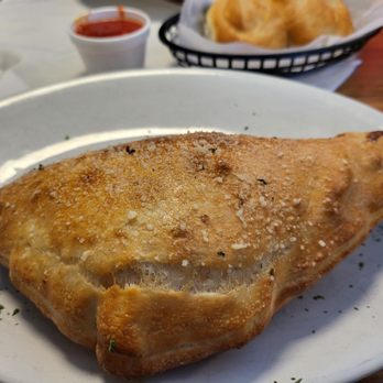 Luigi's - Calzone made with pepperoni and sausage - Italian Near Me - Bartlesville, Oklahoma