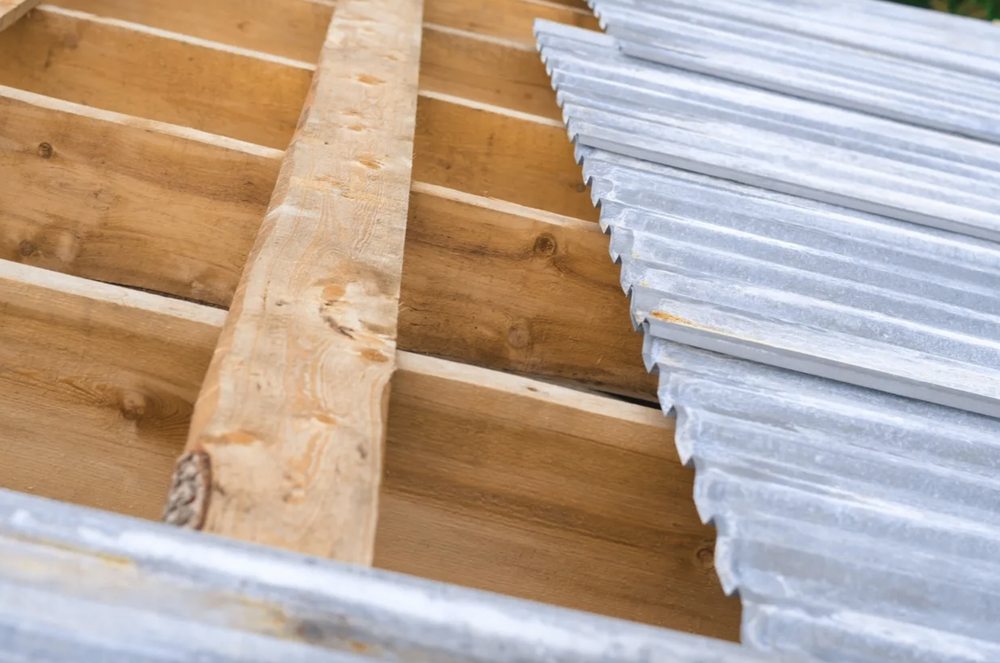 Slide of Harry's Roofing and Construction