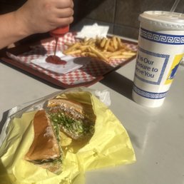 Jr Cheeseburger cut in half, fries and a coke! Jr Cheeseburger cut in half, fries and a coke!