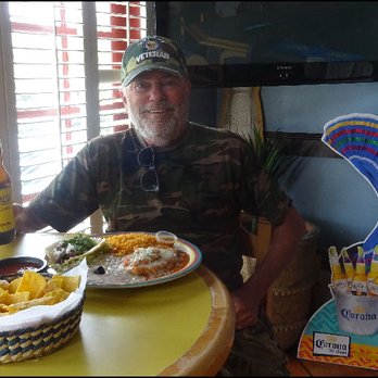 Casa Del Lago  - I toast my host Rafael along with the delicious lunch I'm ready enjoy in the bar area at Casa Del Lago with a Pacifico beer. - Mexican Near Me - Granite Bay, California