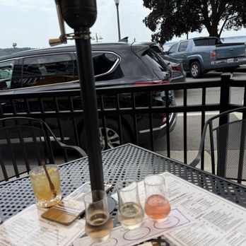 Barrique Wine & Brew Bar - Rose flight and ginger bee cocktail on the patio - Wine Bars Near Me - Lake Geneva, Wisconsin
