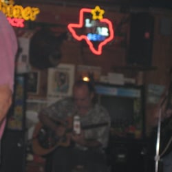 Giddy Ups - Out of focus shot...oddly appropriate being that it's a shot of Ted strummin' the guitar with an empty bottle of whiskey :)