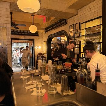 Pastis - Bar seat, looking toward the kitchen - French Near Me - New York, New York Pastis - Bar seat, looking toward the kitchen - French Near Me - New York, New York