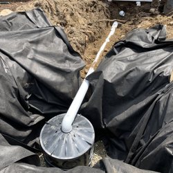 DC EXCO - Drywell install for roof drains