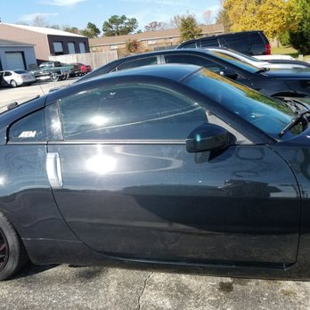 Audio Evolution - Passenger side window after the tints were installed. - Electronics Near Me - Charleston, South Carolina Audio Evolution - Passenger side window after the tints were installed. - Electronics Near Me - Charleston, South Carolina
