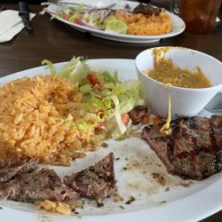 Sauganash Grill - Steak Jibarito with rice and beans and side salad.