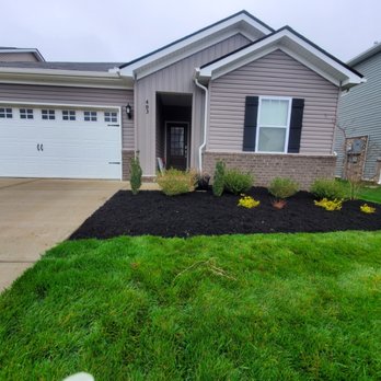 Zelmor Landscaping - the front yard of a home - Lawn Services Near Me