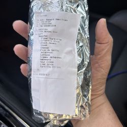 Freebirds World Burrito - This is apparently the new monster size. Check the order sticker. Not coming back. EVER.