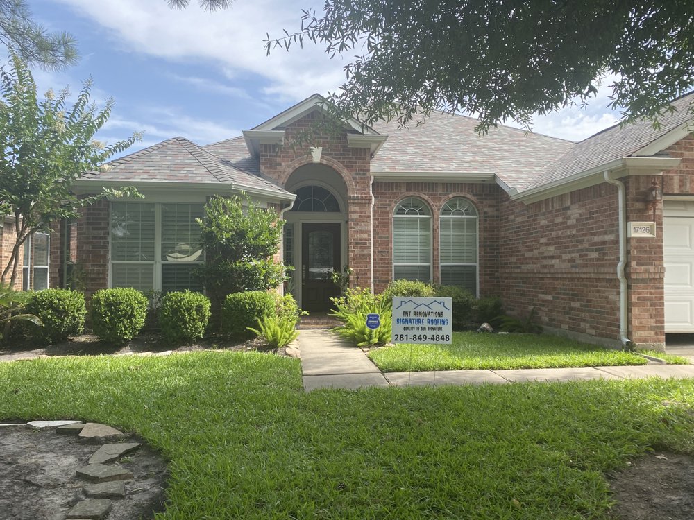 Slide of TNT Renovations Signature Roofing