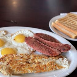 Heidi's Family Restaurant - Reindeer Sausages w/ 3 eggs, hash potatoes, and sourdough toast