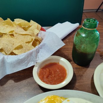 El Sombrero - Chips and salsa by the bottle!  Nice touch. - Mexican Near Me - Saginaw, Texas