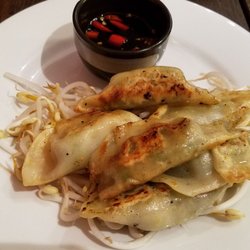 Bamboo Box - Pan Grilled Pork Gyoza with a tasty spicy sauce
