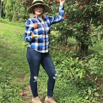 Locust Grove Fruit Farm - a woman picking apples - Farmers Market Near Me - Milton, New York