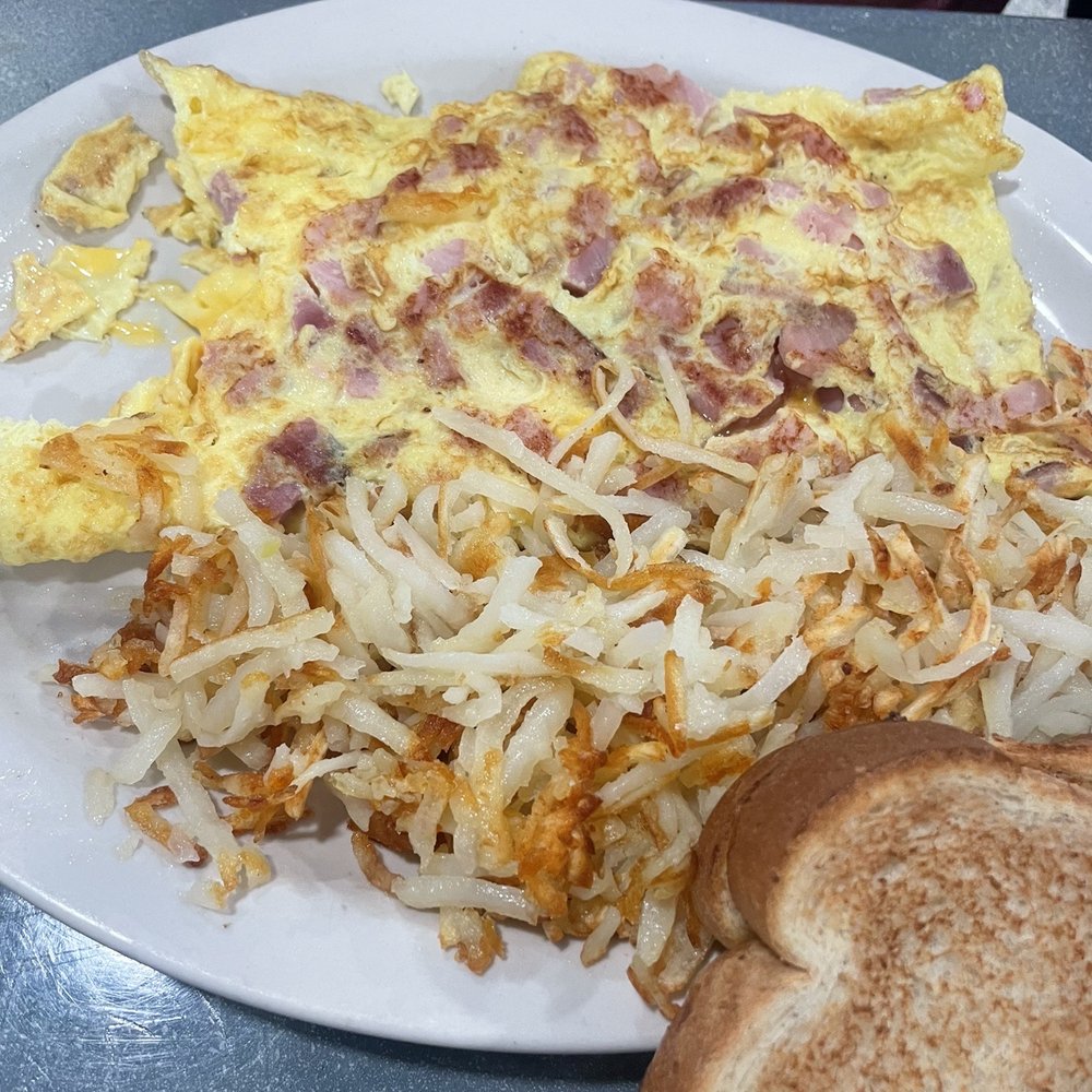 Main St. Cafe - Ham and cheese omelet with hash browns and toast. - American Near Me - Belleville, Illinois