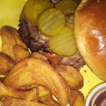 Our Glass Restaurant & Bar - Smoked Chopped Beef Sandwich - Sports Bars Near Me - Irving, Texas Our Glass Restaurant & Bar - Smoked Chopped Beef Sandwich - Sports Bars Near Me - Irving, Texas