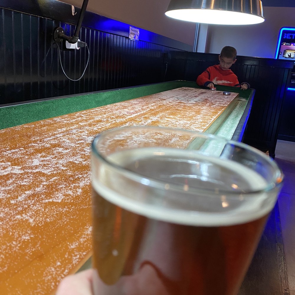 Ronny G's - My beer while my kid kicks my a$$ at shuffleboard :( - Sports Bars Near Me - The Woodlands, Texas Ronny G's - My beer while my kid kicks my a$$ at shuffleboard :( - Sports Bars Near Me - The Woodlands, Texas