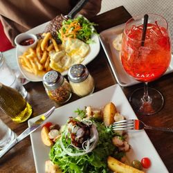 ZAZA Italian Gastrobar & Pizzeria - Steak and eggs above, Octopus Salad below