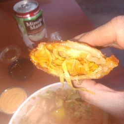 Hello Thai - Biting into a vegetable egg roll