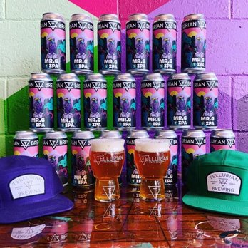 Tellurian Brewing - a stack of cans of beer and two glasses of beer - Brewpubs Near Me - Charles City, Iowa Tellurian Brewing - a stack of cans of beer and two glasses of beer - Brewpubs Near Me - Charles City, Iowa