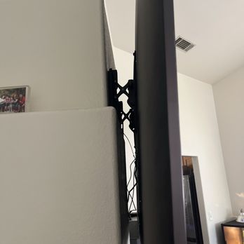 EZ TV Mounting - The wall above our fireplace is odd shaped and has different levels - Home Theatre Installation Near Me