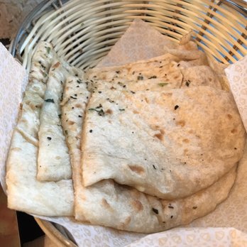 Tarka Indian Kitchen - Garlic Naan ($2.50) - Indian Near Me - Houston, Texas Tarka Indian Kitchen - Garlic Naan ($2.50) - Indian Near Me - Houston, Texas