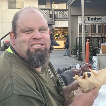 Whisk on Wheels - Blue cheese angus burger enjoyed by this guy! - Caterers Near Me Whisk on Wheels - Blue cheese angus burger enjoyed by this guy! - Caterers Near Me