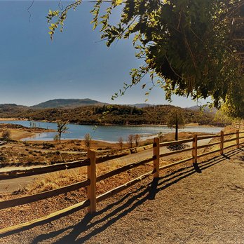 Langtry Farms - Our outdoor tasting with the view of Deter Lake and Tephra Ridge. - Wine Tasting Room Near Me - Middletown, California Langtry Farms - Our outdoor tasting with the view of Deter Lake and Tephra Ridge. - Wine Tasting Room Near Me - Middletown, California