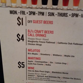 BJ's Restaurant & Brewhouse - It says $4 for a craft beer, but that "is not true" per the server.  "It's actually about $4.50/beer." says the server. - Pizza Near Me - Plano, Texas