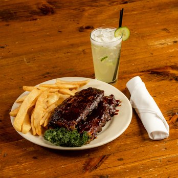 Camp Ticonderoga - BBQ Ribs Steamed to "fall-off-the-bone" tenderness, Jack Daniels BBQ sauce, potato, coleslaw and bread. - American Near Me - Troy, Michigan