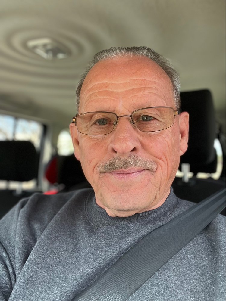 Elmore's Barber & Styling Shop Logo