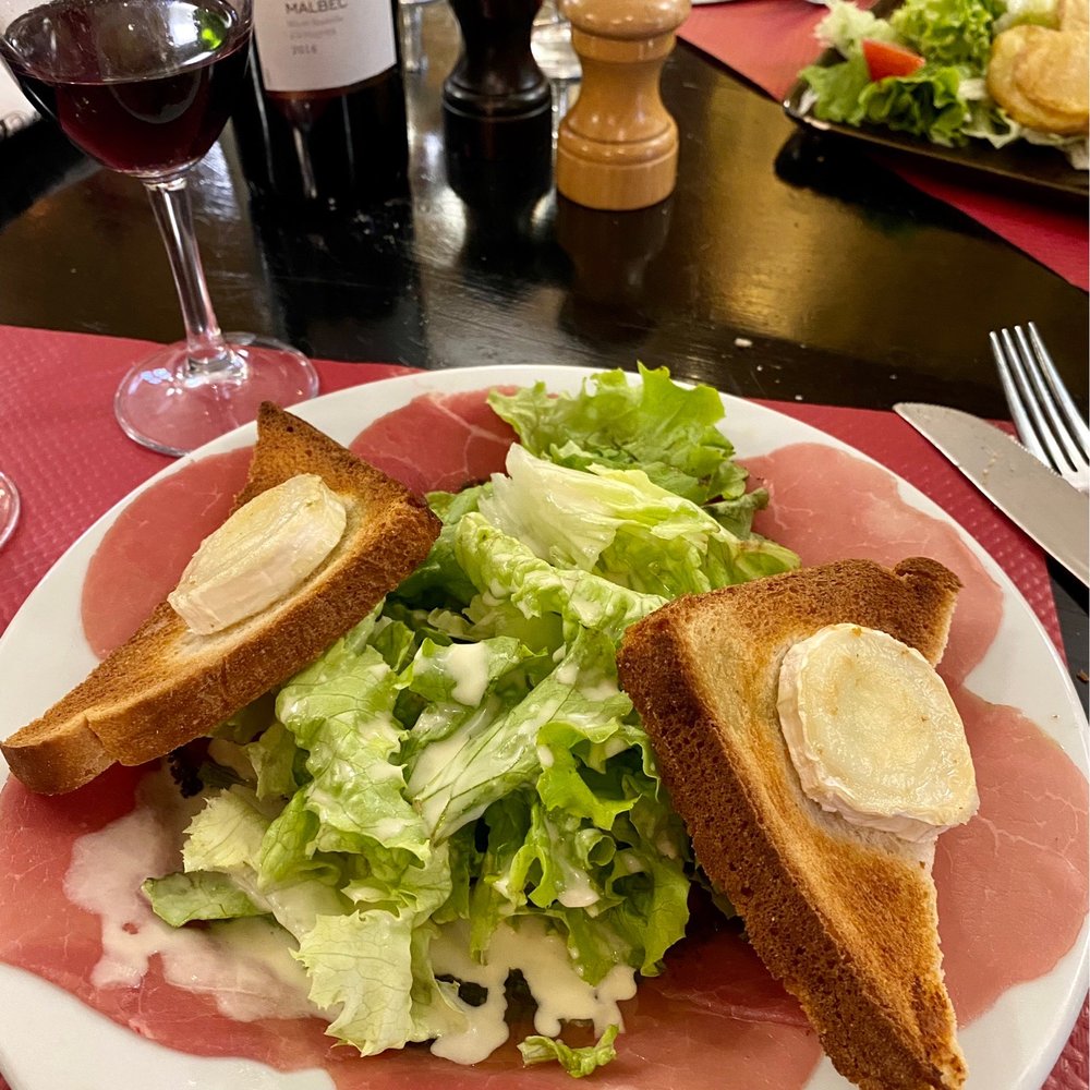 Le Toucan - Beef carpaccio served with salad and goat cheese - Brasseries Near Me - Paris, 75 Le Toucan - Beef carpaccio served with salad and goat cheese - Brasseries Near Me - Paris, 75