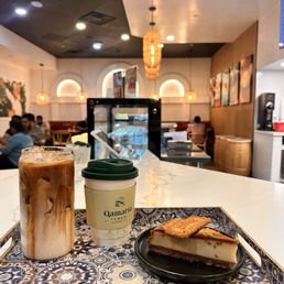 Biscoff cheesecake, Iced Qamaria Latte, Adeni Tea
