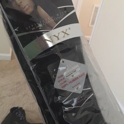 Winder Beauty Supply - Suppose to be 100% human hair for under $50. Not sure how it holds up, yet.