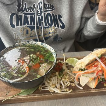 Saigon Kitchen & Bar - Tuesday special 1/2 beef pho 1/2 pork belly/pate Bahn mi. - Vietnamese Near Me - Ann Arbor, Michigan