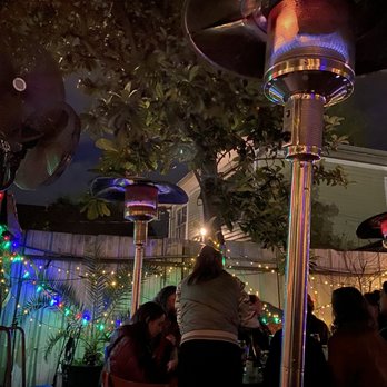 Bacchanal Fine Wine & Spirits - Patio with Beautiful Lights and Heated Torches. - Beer, Wine & Spirits Near Me - New Orleans, Louisiana Bacchanal Fine Wine & Spirits - Patio with Beautiful Lights and Heated Torches. - Beer, Wine & Spirits Near Me - New Orleans, Louisiana