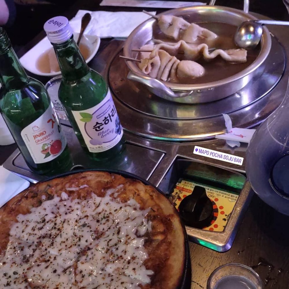 Cheese bacon kimchi pancake, soju, and fishcake soup / IG @mwy.eats Cheese bacon kimchi pancake, soju, and fishcake soup / IG @mwy.eats