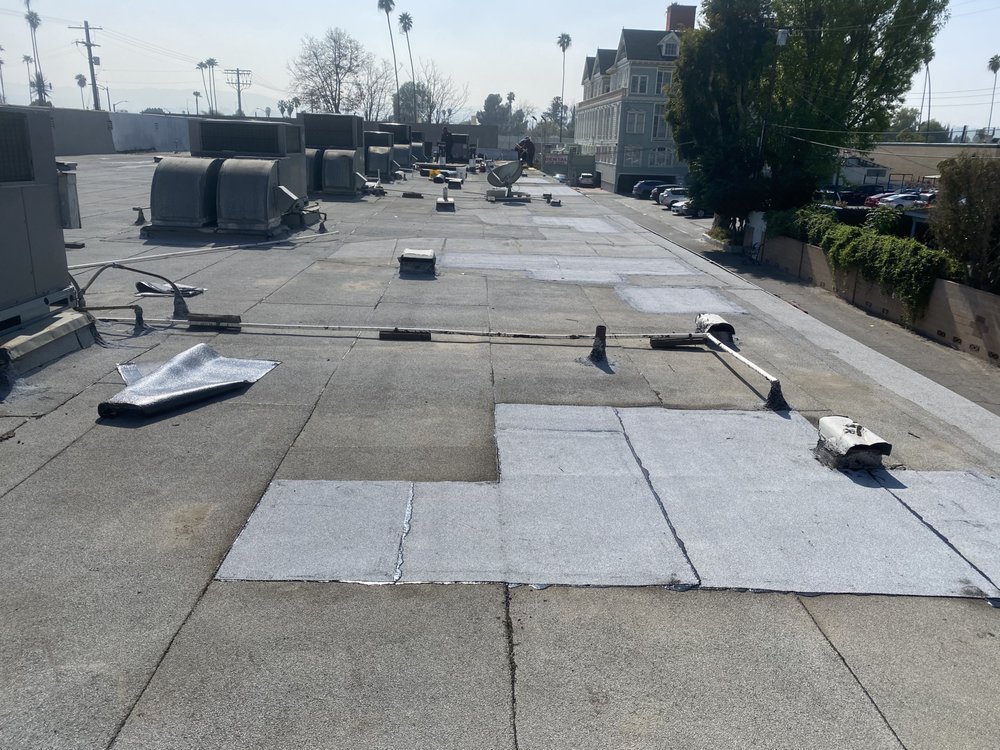 Slide of City Roofing