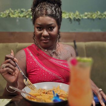 Ibis Cuisine - My exquisite wife and her meal - Caribbean Near Me - Virginia Beach, Virginia