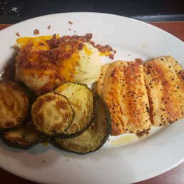 Bourbon glazed Salmon with loaded mashed potatoes and zucchini Bourbon glazed Salmon with loaded mashed potatoes and zucchini