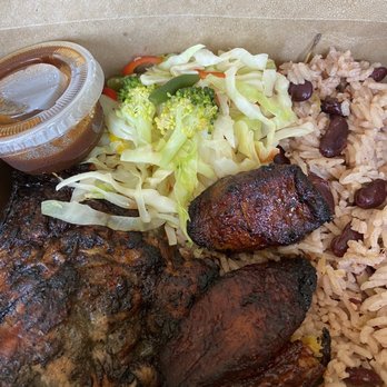 Celest Jamaican Cuisine - Jamaican Jerk Chicken with rice and beans, cabbage and plantains. - Caribbean Near Me - Watertown, New York Celest Jamaican Cuisine - Jamaican Jerk Chicken with rice and beans, cabbage and plantains. - Caribbean Near Me - Watertown, New York