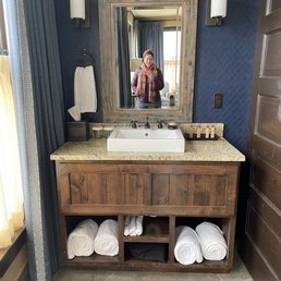 Bathroom and shower behind sliding barn door to the right Bathroom and shower behind sliding barn door to the right