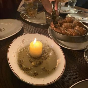 The Belmont - Parker house rolls and tallow candle - Steakhouses Near Me - Naperville, Illinois The Belmont - Parker house rolls and tallow candle - Steakhouses Near Me - Naperville, Illinois