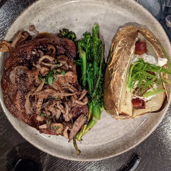 Fielding's - Ribeye, broccolini and loaded baked potato - Breakfast & Brunch Near Me - Bozeman, Montana Fielding's - Ribeye, broccolini and loaded baked potato - Breakfast & Brunch Near Me - Bozeman, Montana