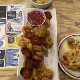 Calamari with banana peppers and chourico with garlic sauce Calamari with banana peppers and chourico with garlic sauce