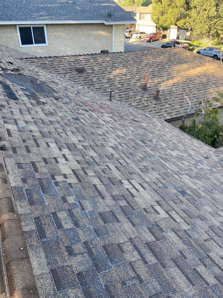 Slide of Alpha Roofing Group