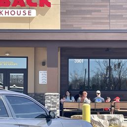 People waiting with the restaurant HALF empty on a Saturday an 1pm. People waiting with the restaurant HALF empty on a Saturday an 1pm.